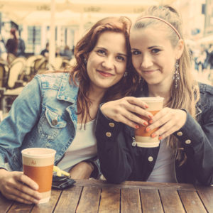 Teenage Girls Drinking at Bar