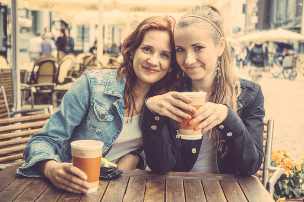 Teenage Girls Drinking at Bar